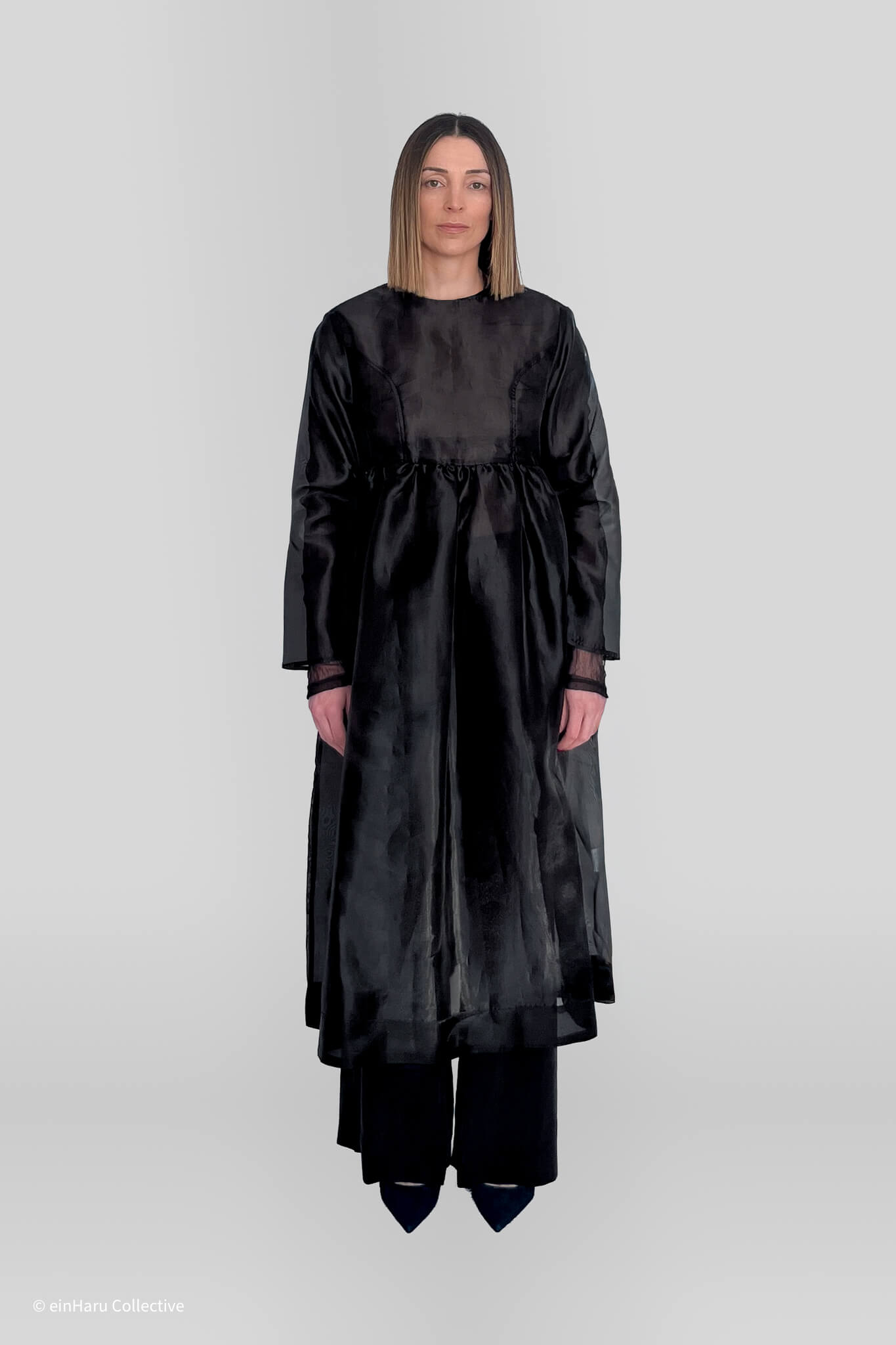 Minimalist layered silhouette representing daily wear philosophy