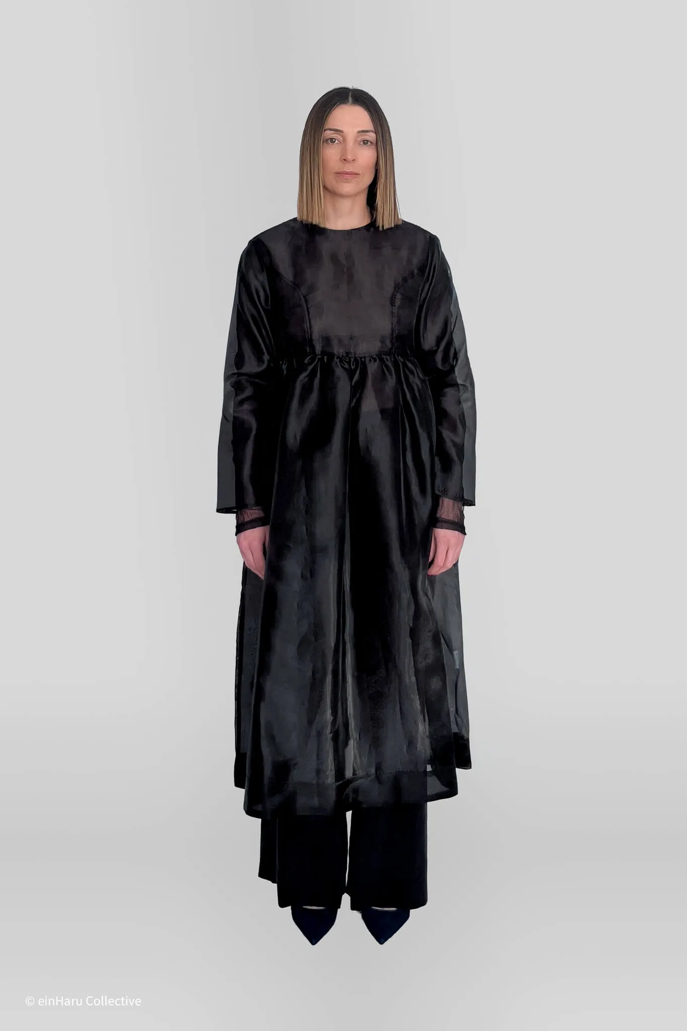 Minimalist layered silhouette representing daily wear philosophy